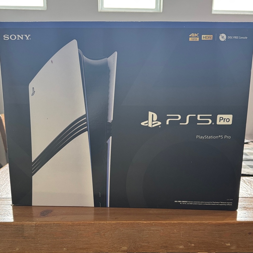 Sony PS5 Pro in White and Black
